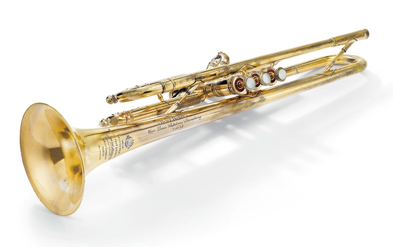 A Selmer model 19 Balanced Action Medium Bore Trumpet, Henri Selmer, Paris, 1948. Brass with worn gold plating. Inscribed ‘DUKE DONINfrom LOUIS “SATCHMO” ARMSTRONG71053.’ With modern case. Offered together with a cotton handkerchief inscribed in Louis Armstrong’s characteristic green ink, ‘To JoellaLouis ArmstrongSatchmo’. Estimate $60,000-80,000. Offered