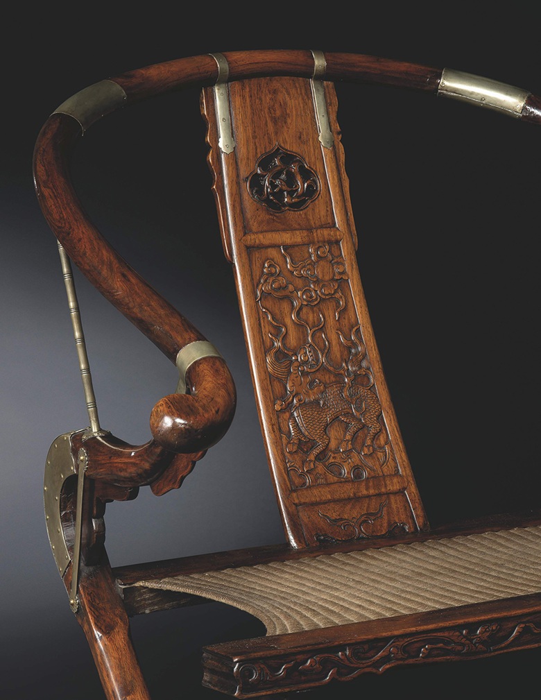 A Magnificent And Exceedingly Rare Huanghuali Folding Horseshoe-Back Armchair, JIAOYI (detail), 17th Century. 42 in. (106.6cm.) high, 29 in. (73.7cm.) wide, 24 ½ in. (62.2cm.) deep. Estimate HK$8,000,000 – 12,000,000. Offered in Classical Chinese Furniture from Heveningham Hall on 28 May 2021 at Christie’s in Hong Kong